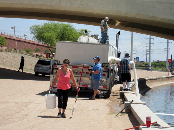 Pat Ann Church at Tempe Town Lake fish delivery